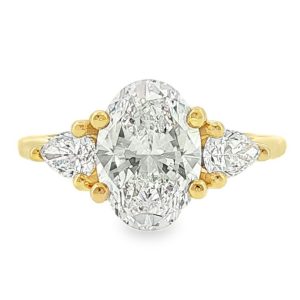 Vintage Engagement Ring with Lab-Grown Oval-Cut Diamond and Accent Stones in 18K Gold