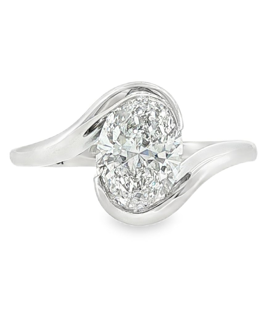Swirl solitaire engagement ring with oval lab grown diamond in 18k white gold
